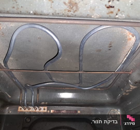 גוף חימום חשמלי בתנור אפייה ישן